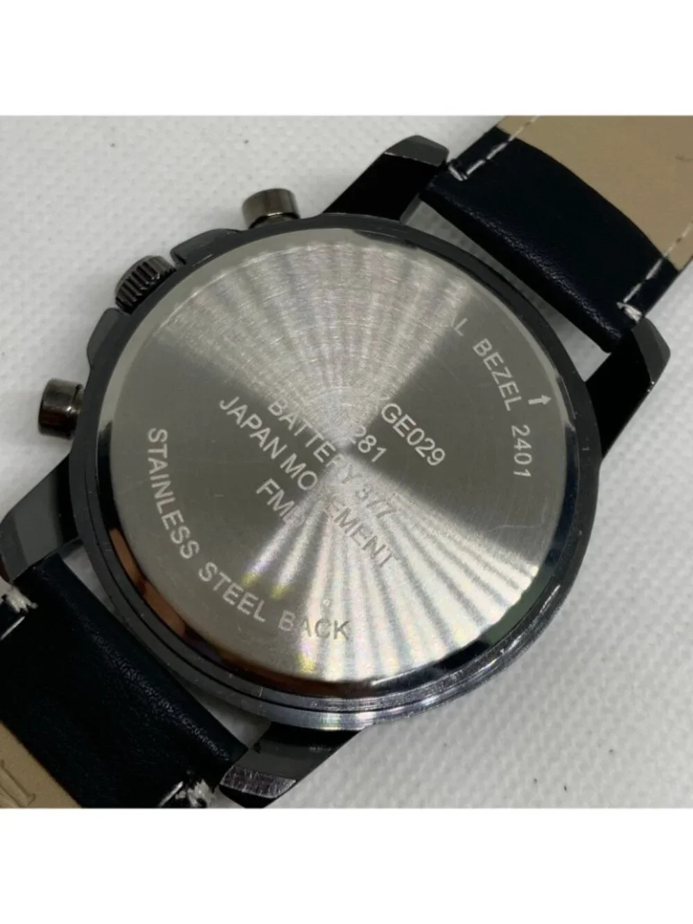 FMD men’s watch black tone quartz analog 50mm Roman indices leather running
